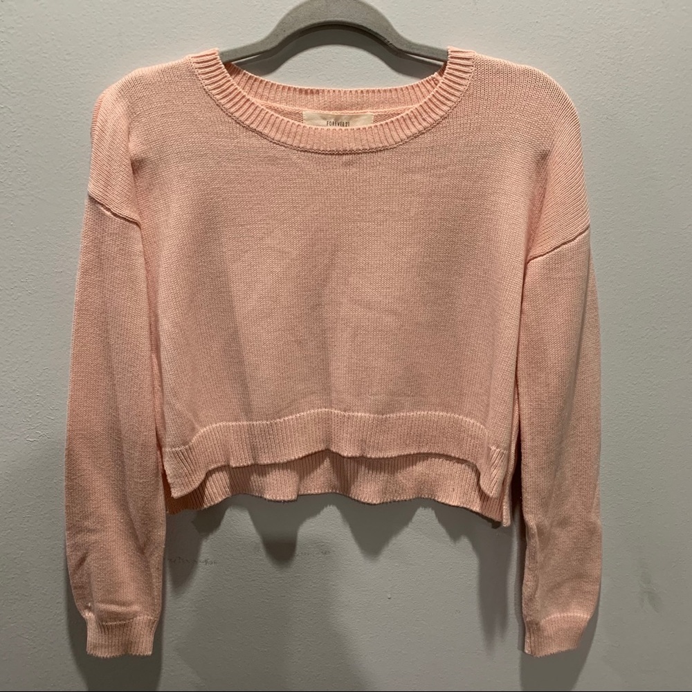 Pink cropped knit sweater